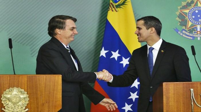 “Deus é brasileiro e venezuelano”, diz Bolsonaro a Juan Guaidó